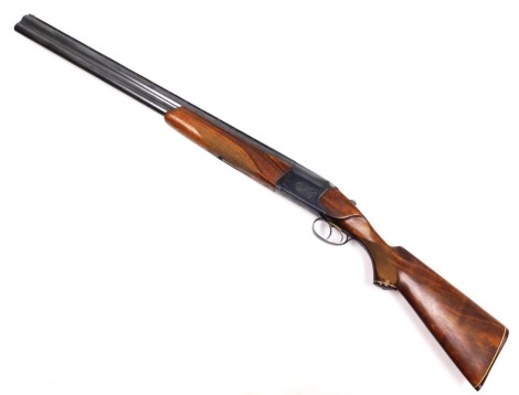 A Baikal 12 bore over/under shot gun, IJ-27, with proof marks, serial no H10423, 108cm long. NB. A current valid Shotgun Certificate is required to view and bid on this lot.