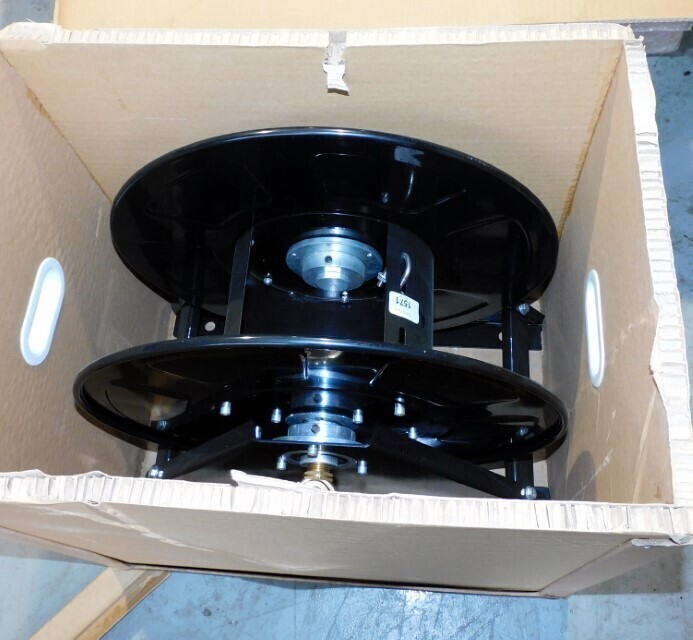A airline reel for a compressor, boxed. This lot is located at our