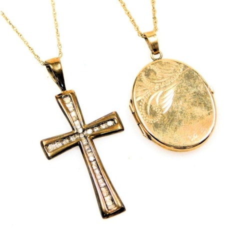 A 9ct gold cased oval locket, on fine chain and a 9ct gold crucifix set with tiny white stones on a fine chain. 5.4g all in. (AF)