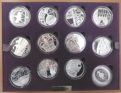 A Royal Mint The Queen's Golden Jubilee 2002 silver proof coin set, containing twenty four coins, some with 22ct gold and enamel decoration, contained in a fitted case with various certificates of authenticity, each coin approx 28.28g. - 3