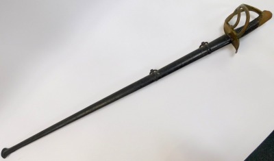 An early 19thC French Cuirassier trooper's sword, possibly 1816 pattern, with leather grip and brass pommel and guard, straight double fullered blade, inscribed to the back, date mark rubbed, and black Japanned metal scabbard, with two hanger rings, lengt - 2