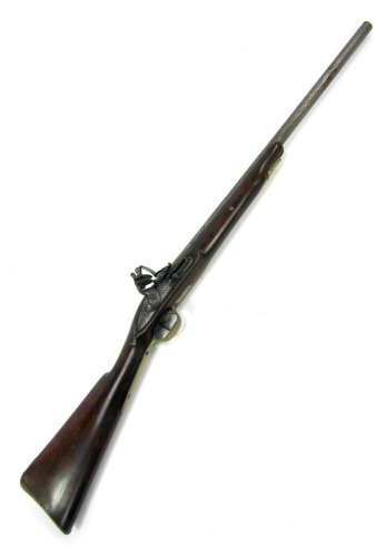 An early 19thC East India Company flintlock musket, by Henshaw of London dated 1803 and bearing mark for the East India Company, lacking ramrod, brass trigger guard and butt plate, walnut stock, 114cm long overall.