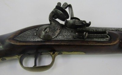 An early 19thC East India Company flintlock musket, by Henshaw of London dated 1803 and bearing mark for the East India Company, lacking ramrod, brass trigger guard and butt plate, walnut stock, 114cm long overall. - 2