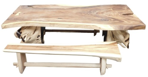 A large tree root table, the rectangular top raised on two tree root supports, 80cm high, the top approx 122cm x 260cm, together with two benches, each 47cm high, 196cm wide.