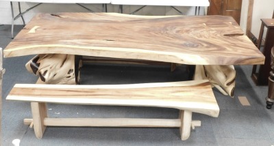 A large tree root table, the rectangular top raised on two tree root supports, 80cm high, the top approx 122cm x 260cm, together with two benches, each 47cm high, 196cm wide. - 2