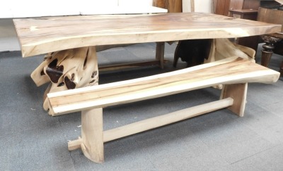 A large tree root table, the rectangular top raised on two tree root supports, 80cm high, the top approx 122cm x 260cm, together with two benches, each 47cm high, 196cm wide. - 3