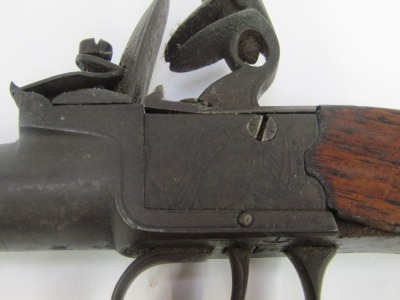 An 18thC boxlock flintlock pocket pistol by Hill of London, with oak grip, 15.5cm long. - 2