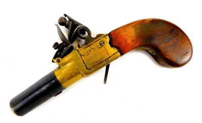 An 18thC boxlock flintlock pocket pistol by Gill of London, with brass lock plates and walnut stock, 15.5m long.