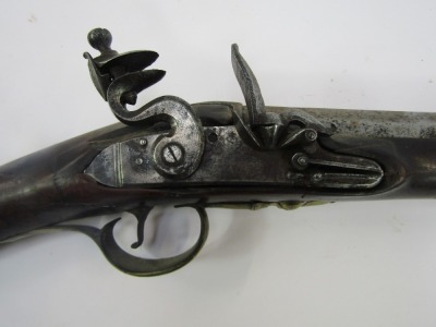 An early 19thC flintlock musket by Barber and Boaler of Newark, with ramrod and brass furniture, with walnut stock, stamped, 138cm long overall. - 2