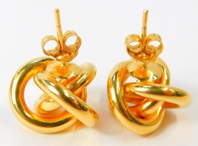 A pair of 18ct gold twist design earrings, each with two layered loops, 2cm wide, on single pin back with butterfly back, 5.4g. - 2