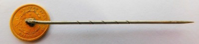 A United States one dollar coin mounted tie pin, on steel pin, 6cm high. - 2