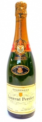 A bottle of Laurent Perrier champagne, 75cl.