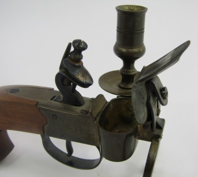 A novelty flintlock pocket pistol table lighter, with brass candle holder, 13cm long. - 2