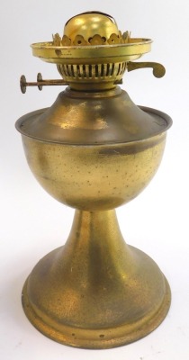 A 20thC oil lamp, with yellow glass shade above a chrome base, with chimney, 60cm high, together with a further brass oil lamp base, two glass chimneys and a moulded glass shade. - 4