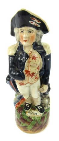 A Staffordshire pottery jug, modelled as Nelson, 27cm high.