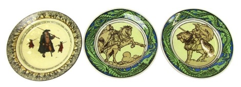 A Royal Doulton Izaak Walton series pottery plate, decorated with figures and My Heart Alone My Work Can Do, So I Can Fish and Study Too. Perch or Pike, Roach or Dace We Do Chase, printed marks, 26.5cm diameter, together with two Royal Doulton St George a