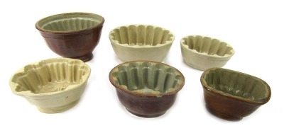 A group of 19thC stoneware and other jelly moulds, to include a mould by Lovatt's Langley ware, 21cm wide.