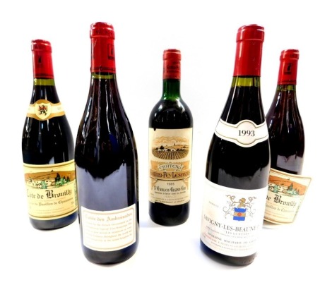 Five bottles of French red wine, comprising three bottles of Cote Brouilly 2009, a bottle of Savigny-Les-Beaune Premier Cru 1993, and a bottle of Chateau Grand Pey Lescours 1985.