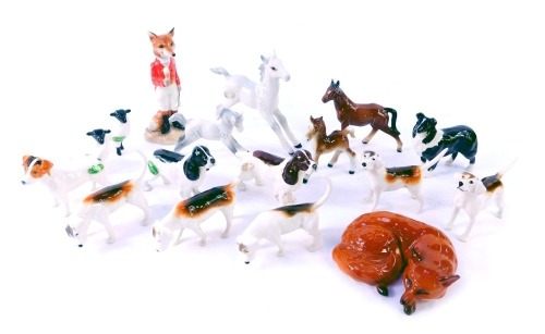 A group of Beswick pottery animals, comprising hunting scene dogs, foal, a fox, dapple grey foal and pony, two sheep, sheep dog, terrier. (a quantity)