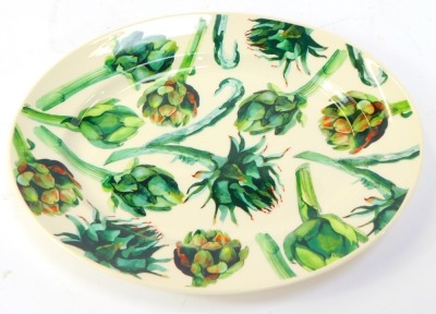 A group of Emma Bridgewater pottery from the Vegetable Garden series, comprising an oval platter in the Artichoke pattern, 36cm wide, and two small bowls decorated with garlic and chilli, 12.5cm diameter. (3) - 2