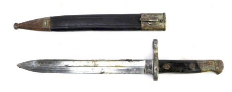 A Spanish Mauser 1893 pattern bayonet, inscribed Artilleria Fca de toledo, 1897 to the ricasso, with fullered blade, 25.5cm, with leather and steel scabbard.