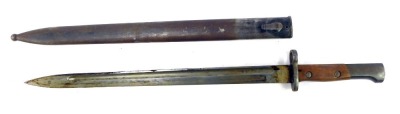 A British Army 1907 pattern bayonet, with wooden handle, with steel scabbard, length of blade 38cm.