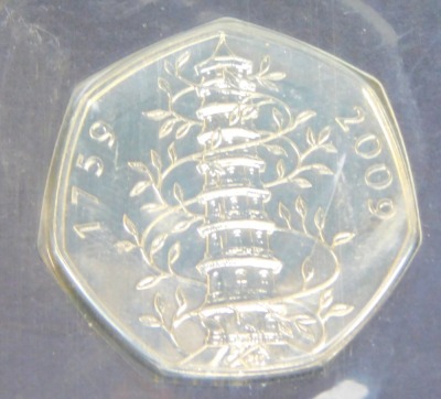 A Royal Mint 2009 Kew Gardens fifty pence brilliant uncirculated coin, in plastic packaging. - 2