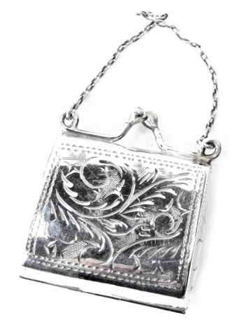 A novelty miniature purse, with chain link and engine engraved decoration, white metal stamped 925, 3cm high, 0.31oz.