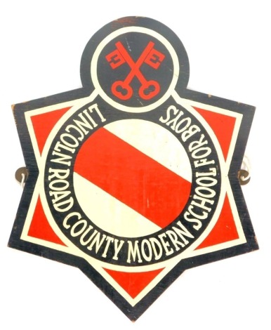 A painted crest wall hanging, for The Lincolnshire Road County Modern School for Boys, with cross key emblem, 36cm x 29cm.