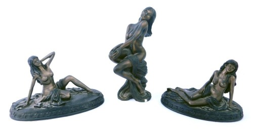 Three bronze style Craft Collection of Regency Fine Art figures, comprising Posing, Reclined, and another, untitled, of a semi clad female perched on rocks, 17cm wide and 21cm high. (3)