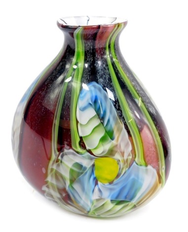 A 20thC Art Glass vase, of pear shaped form, on a purple and green ground, 25cm high.