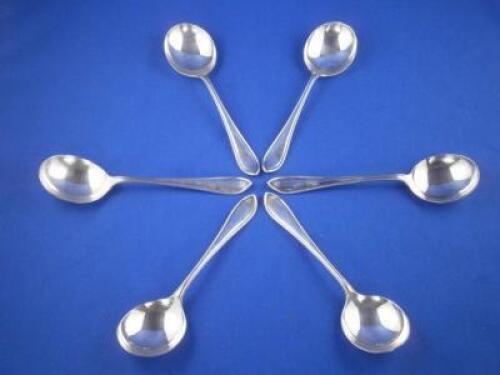 A set of six silver soup spoons