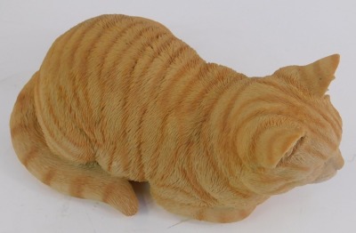 A resin figure of a seated ginger cat, 26cm wide. - 2