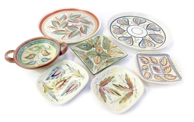 A group of Denby Glynn Colledge wares, comprising three Bourne Denby rectangular pin dishes, an unmarked two handled bowl, a Denby square trinket dish, and two Denby dinner plates, each of floral decoration, the plates 25cm diameter. (7)