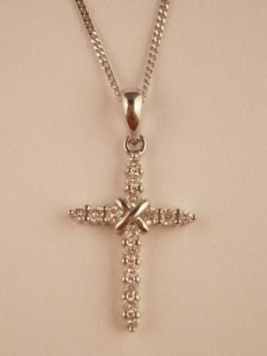 A 9ct white gold (import) crucifix