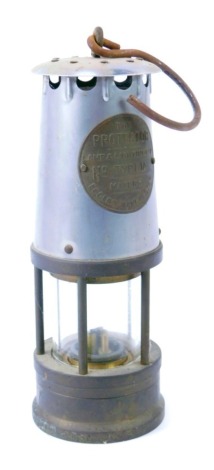 A Protector Lamp and Lighting Company Eccles mining lamp, type 1A, with swing handle, 24cm high.