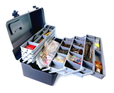 Fishing tackle, comprising a fisherman's toolbox, with various spools, lines, floats, weights, etc. (1 box)