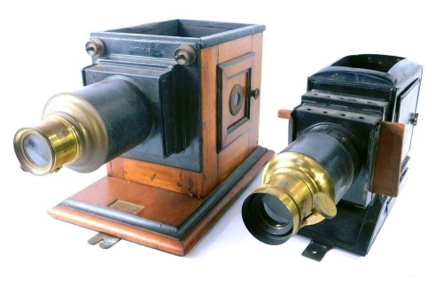 Two late 19thC magic lantern casings.