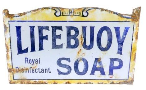 An early 20thC Lifebuoy Soap enamel advertising sign, with wall mounted section, on a white and yellow ground, 23cm high, 41cm wide.