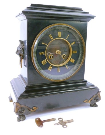 A late 19thC French slate mantel clock, the dial with black chapter ring bearing Roman numerals, eight day movement by L Marli and Ci, bell strike, the case of architectural form, with twin lion's head and ring handles, raised on claw and ball feet, with 