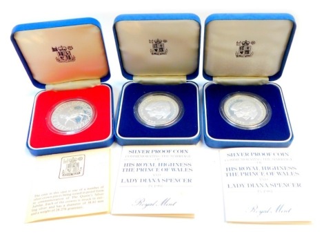 Three silver proof collector's coins, comprising His Royal Highness Prince and Wales and Lady Diana Spencer coins, and the Elizabeth II 1977 collector's five pound coin, boxed. (3)