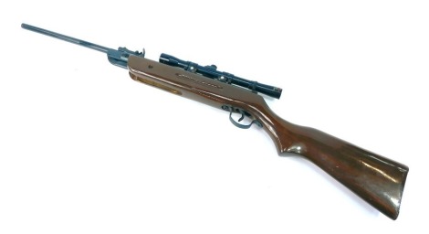 A Westlake .22 calibre air rifle, with Nikko Stirling 4x20 sight, on a brown stock, 96cm long.