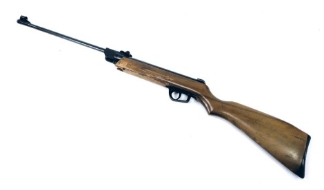 An Eligama ASI Sniper .22 calibre air rifle, with a wooden stock, serial no 422134, 103cm long.