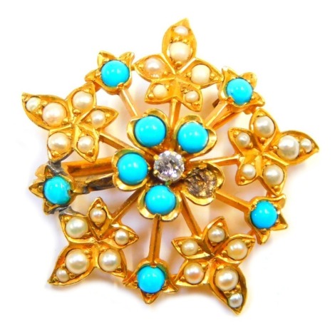 An Edwardian brooch, of circular design set with seed pearls and turquoises, and a central diamond in claw setting, yellow metal unmarked, one turquoise missing to central pattern, 2.5cm wide, 4.2g all in.