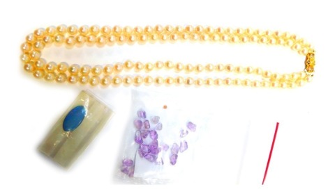 A two row cultured pearl necklace, with yellow metal clasp stamped 375, 46cm long, loose amethyst and opal stones, etc.