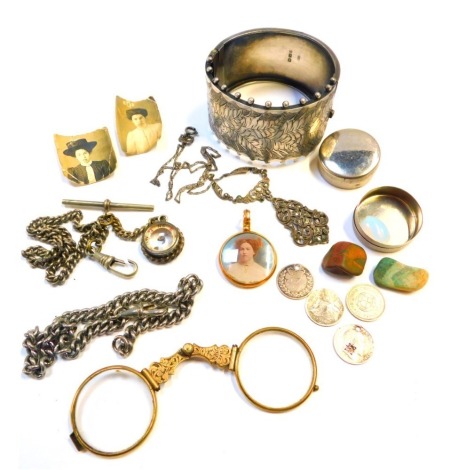 A Victorian silver bangle, with fern spray and a beaded outer border, a silver and marcasite pendant and chain, 42.4g all in, and various pill boxes, white metal watch chains, single monocle, etc. (a quantity)