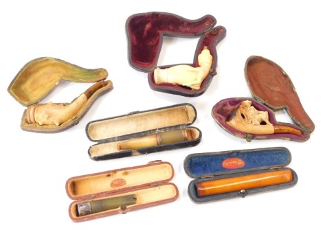 Six pipes, comprising an amber cheroot holder, meerschaum and amber pipe, meerschaum handled partial pipe, etc. (6, AF)