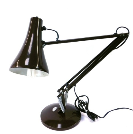 A brown Anglepoise lamp, 82cm high. WARNING! This lot contains untested or unsafe electrical items. It is supplied for scrap or re-conditioning only. TRADE ONLY