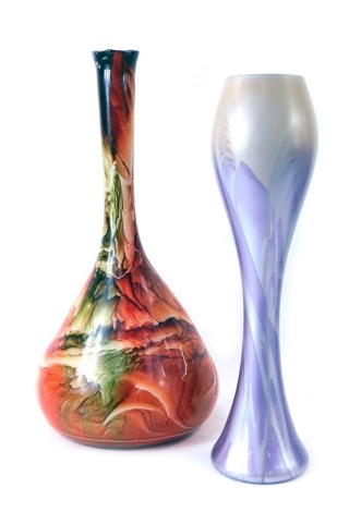 Two Art Glass vases, with mouth blown silvered and purple finish stem vase, 40cm high, an orange and green dyed glass vase, 44cm high. (2)