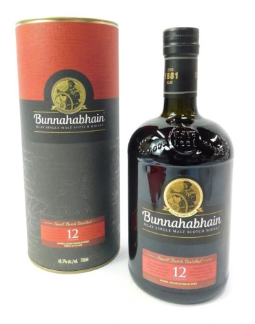 A Bunnahabhain bottle of Single Malt Scotch whisky, 700ml bottle, aged to twelve years, in presentation cardboard tube, 24cm high.